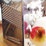 Grate the apple down to the core