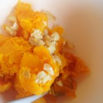 Put cooked squash and garlic in a bowl