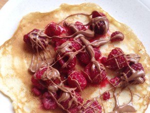 Raspberries and melted chocolate--delicious pancake topping